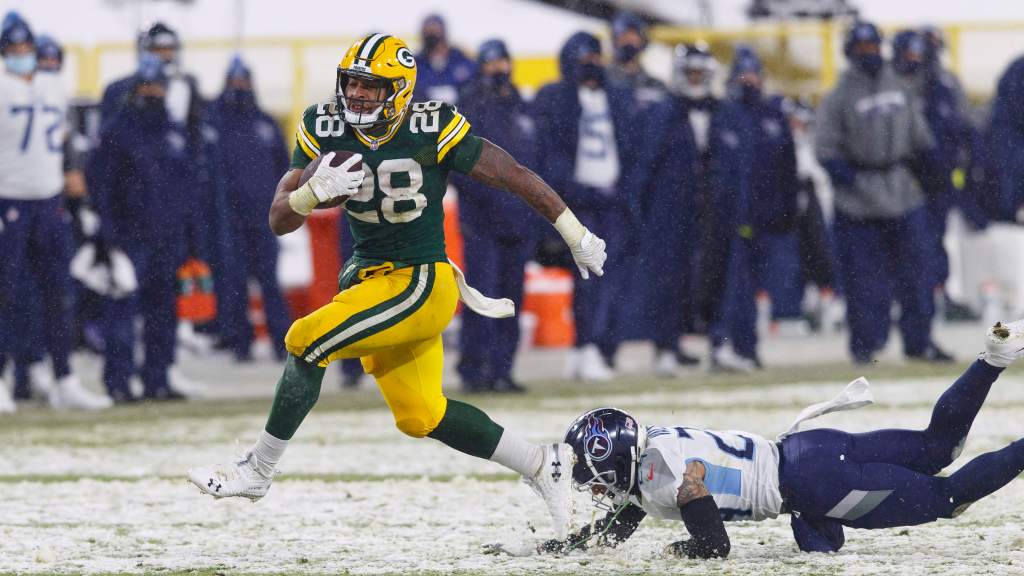 Upcoming Packers AJ Dillon shines in a landslide victory over the Titans

