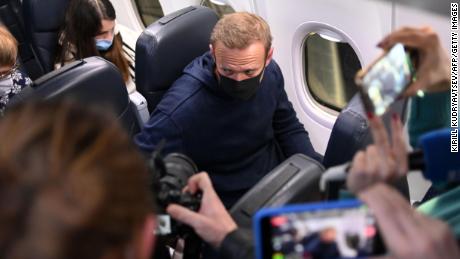 Russian opposition leader Alexei Navalny is in a Pobeda plane after landing at Sheremetyevo Airport in Moscow on January 17, 2021.