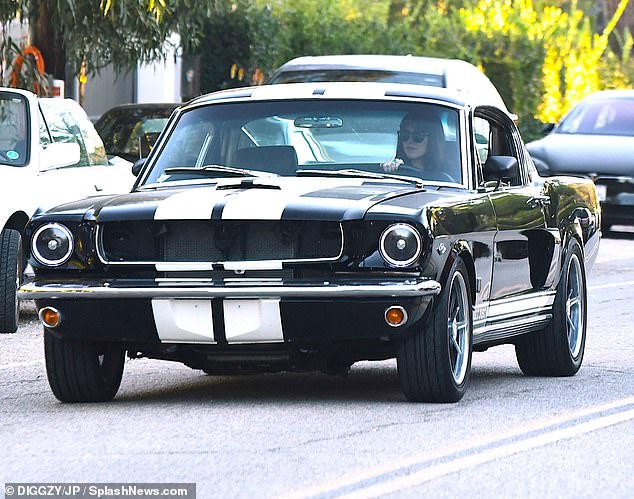 Wheels: The 31-year-old actress was spotted driving her Vintage Shelby GT350 Mustang as she stopped at a friend's house