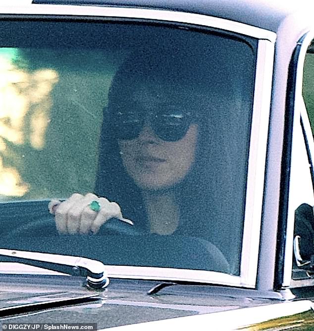 To be a bride?  Dakota Johnson went on tour on Saturday and threw a huge emerald ring on her hand amid rumors of her engagement to Chris Martin.