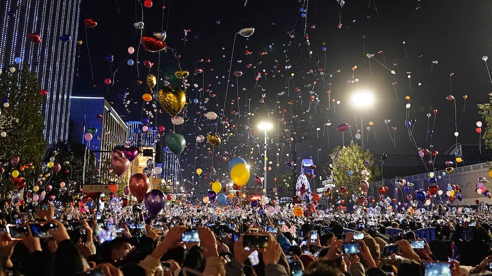 Photos show Wuhan, which was once the epicenter of the epidemic, crowded with New Year’s celebrations.