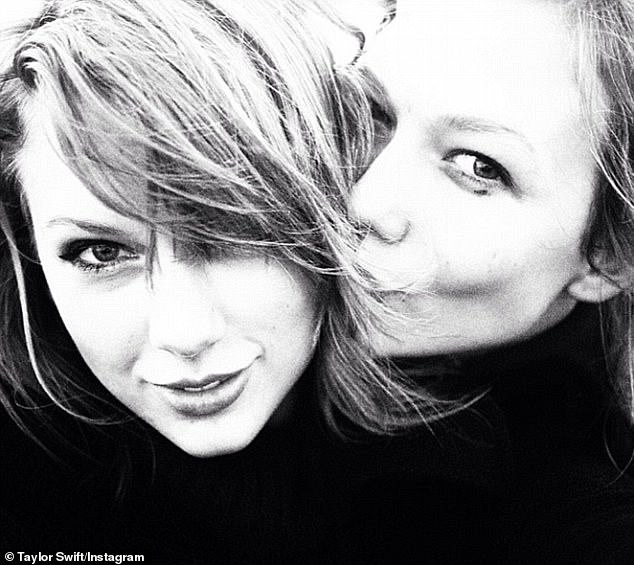 Mystery: Fans of 10-time Grammy Award-winning Taylor Swift (left) are said to think her extra track from Evermore's Time to Go - which hit streaming services on Thursday - is about her ex-boyfriend, Karlie Kloss (on the right, pictured in 2014)